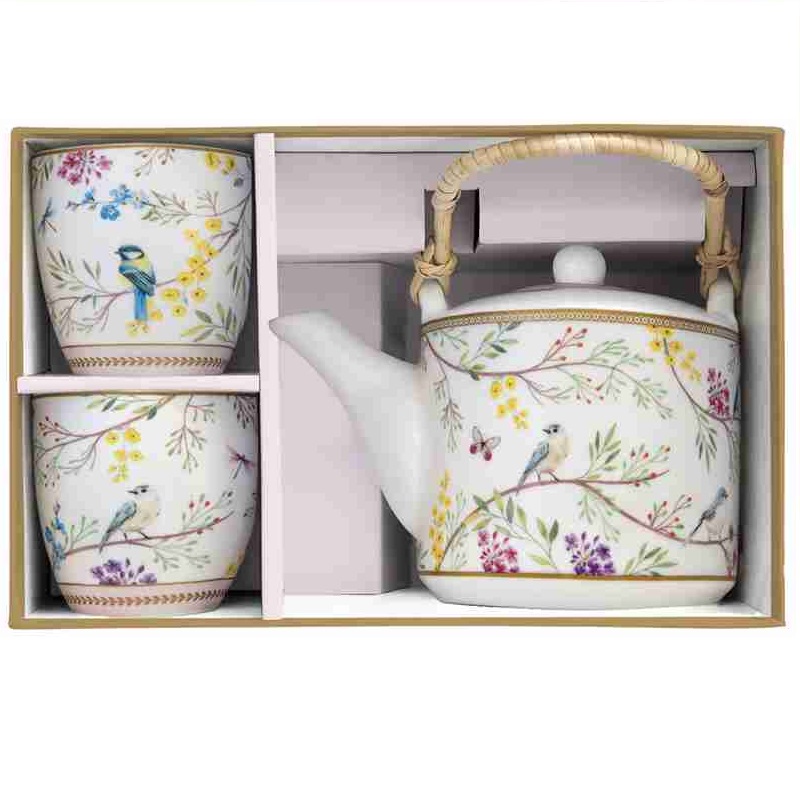 Porcelain teapot with metal infuser and 2 cups in