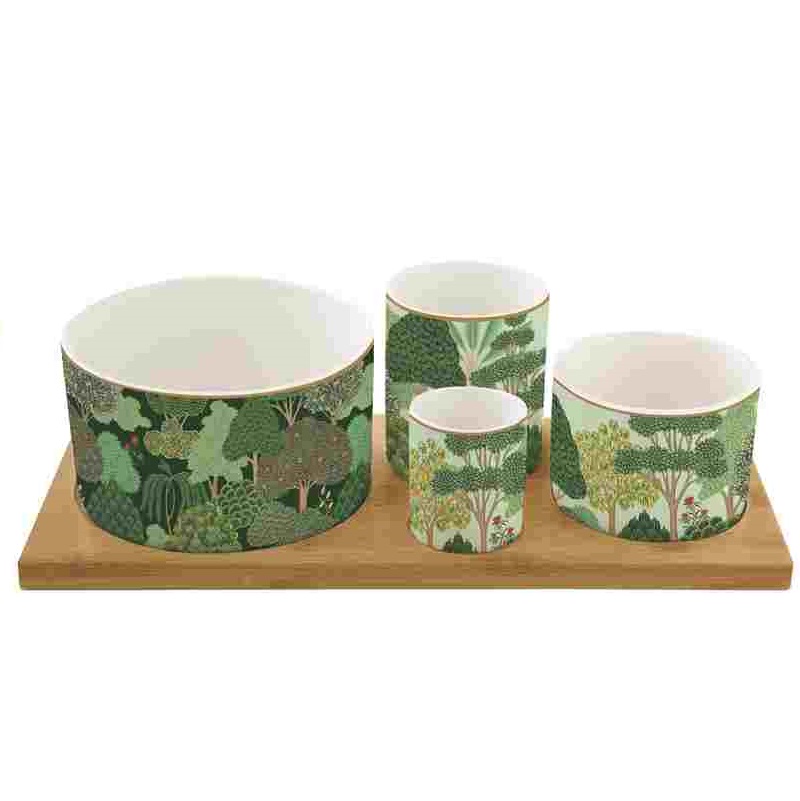 Appetizer set with 4 porcelain round bowls on bamb