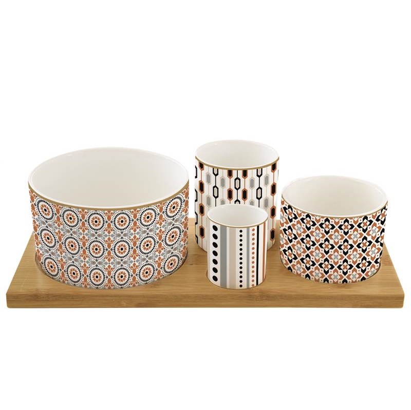 Appetizer set with 4 porcelain round bowls on bamb